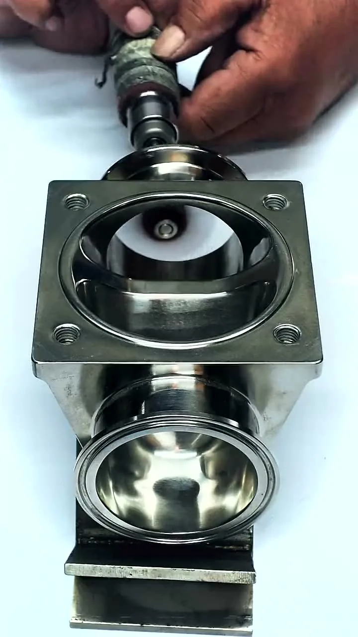 Hand finishing the product contact bowl and weir of a tank bottom valve body